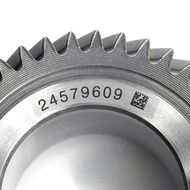 Laser-marked gear with serial number and Data Matrix code.