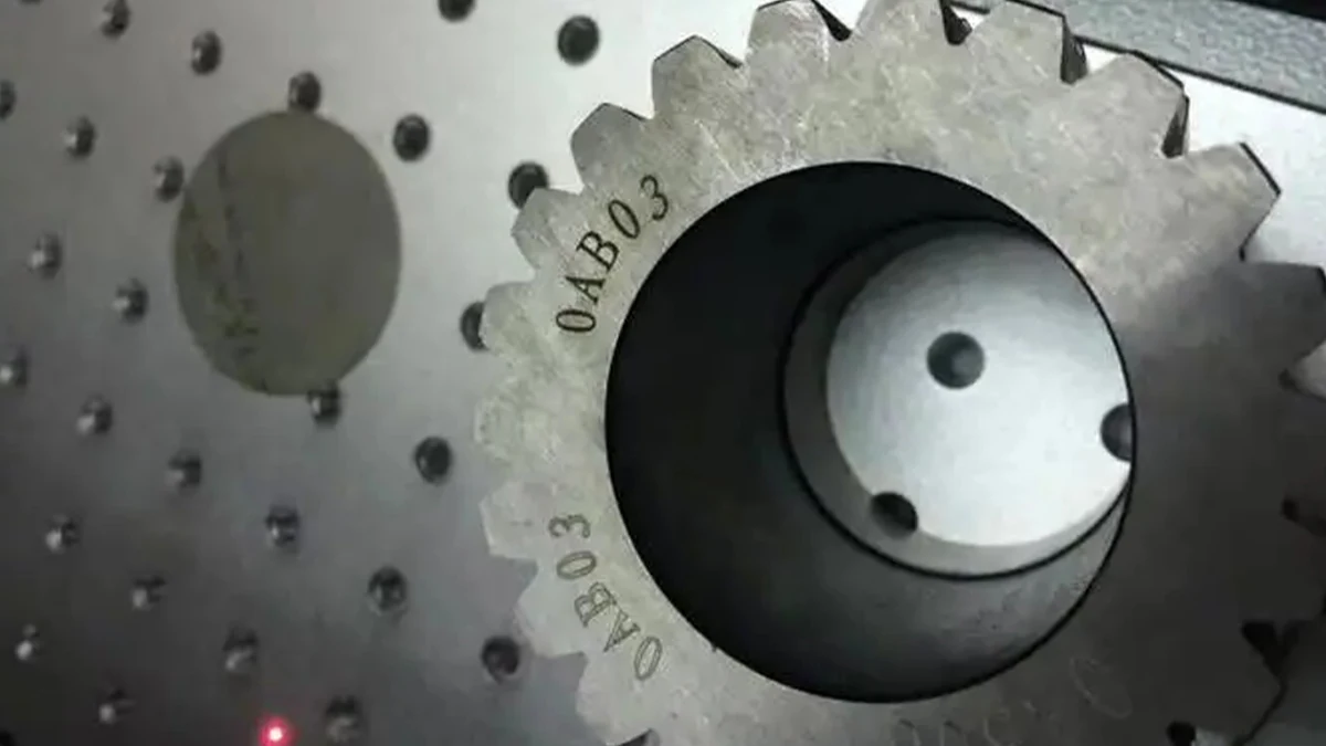 Laser-marked gear sample with alphanumeric part identification