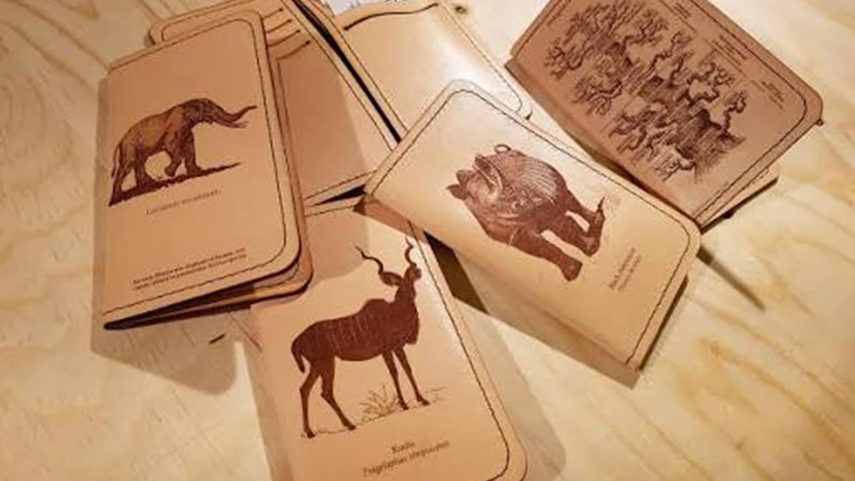 Leather pieces with decorative laser-engraved patterns and illustrations