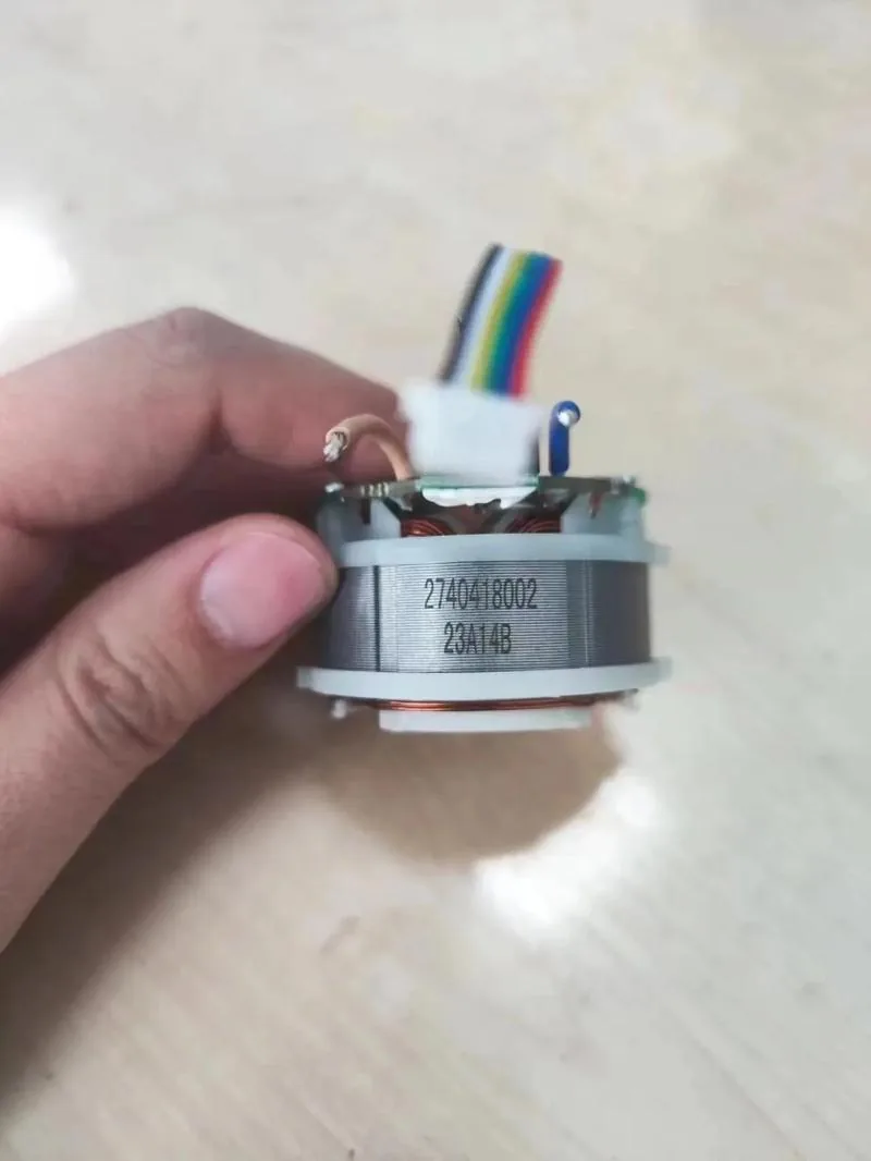 Electrical component with fine identification characters on the housing