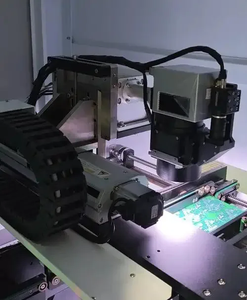 PCB positioned in a laser marking workstation for an electronics marking application