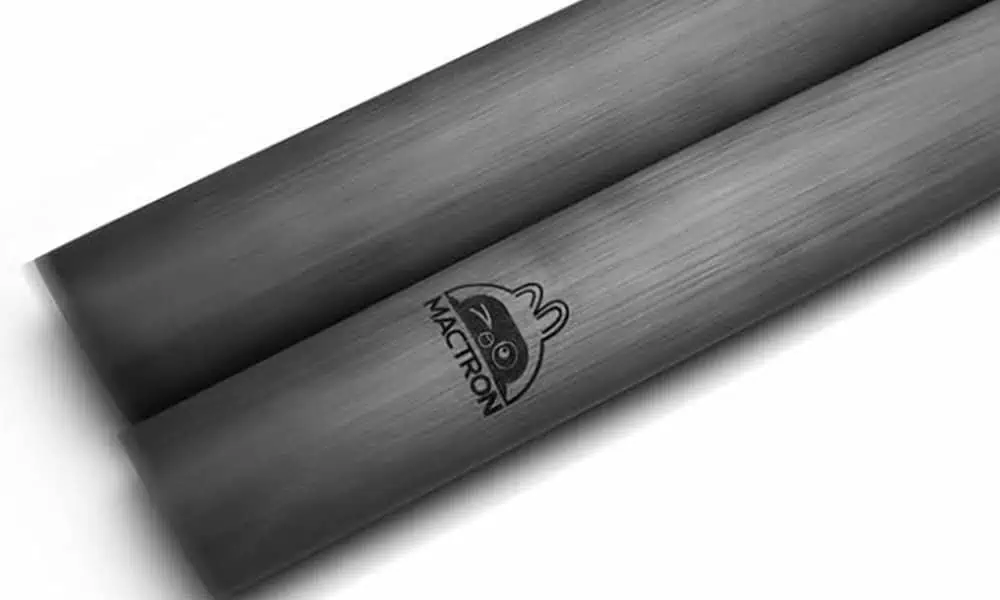 Laser-marked curved carbon-fiber tube illustrating marking on a non-flat surface