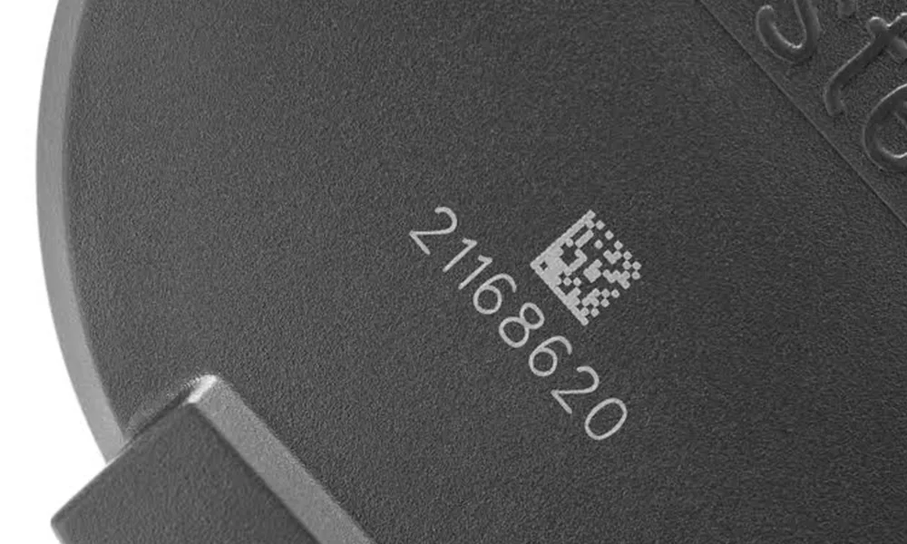 Laser-marked plastic material sample