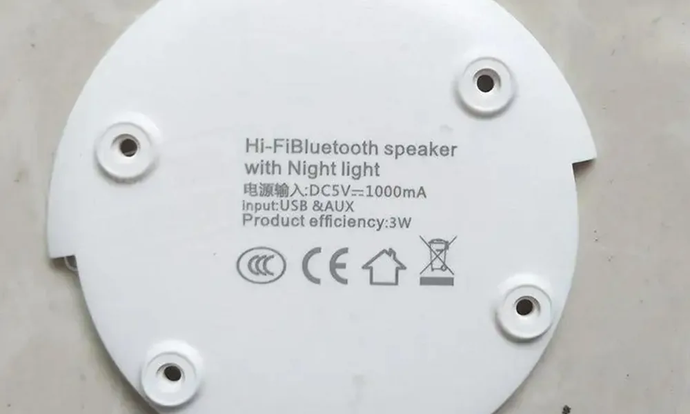 Laser marking example on an ABS plastic housing with product text and symbols