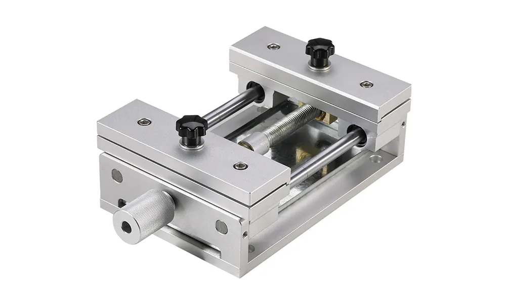 Adjustable metal sheet holder fixture for laser marking