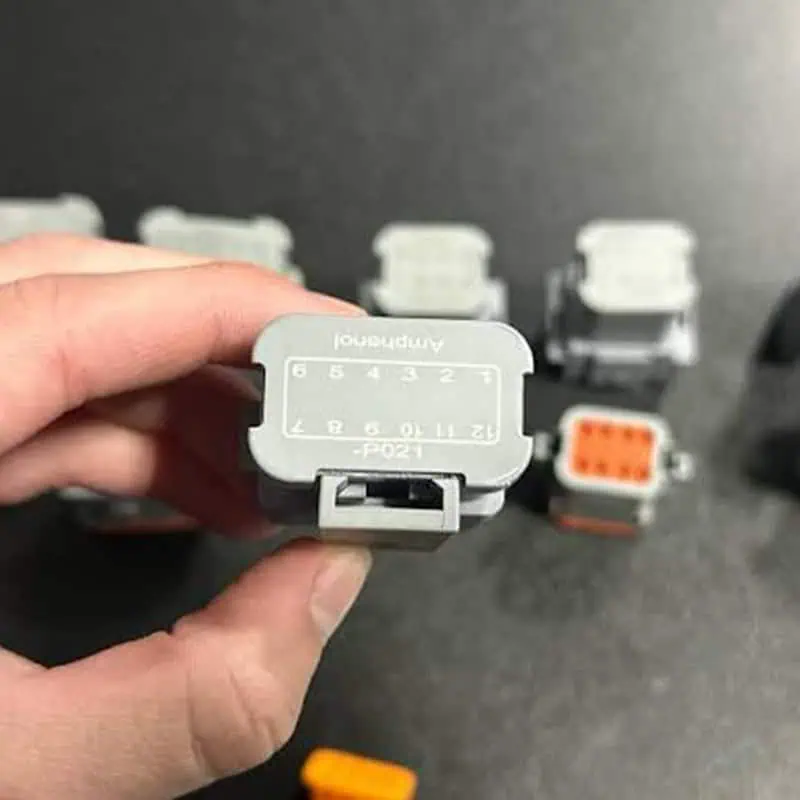 Laser-marked automotive connector housing with terminal position identification