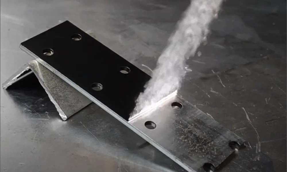 Laser processing on a dark oxide-layer aluminum part